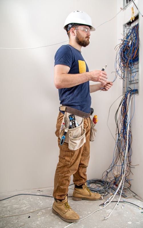 Electrician Working on Wiring